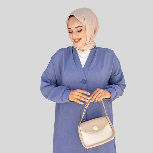 Detail van knopen en bovenstuk van blauwe tuniek co-ord set – Rituwell