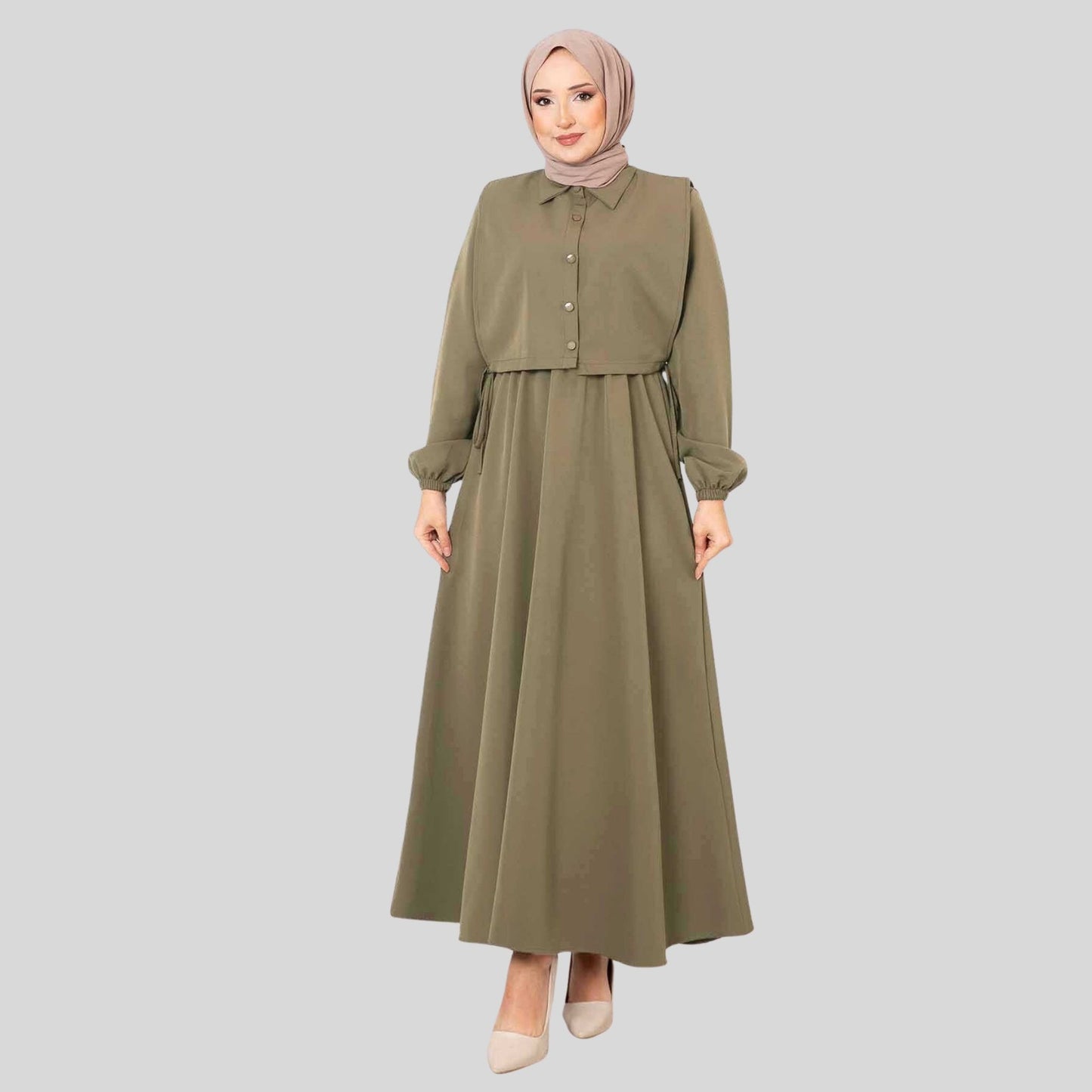 Zijaanzicht van groene maxi jurk met lange mouwen en bolero detail – Rituwell